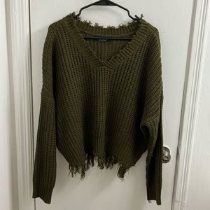 Army green Akira fringe sweater.